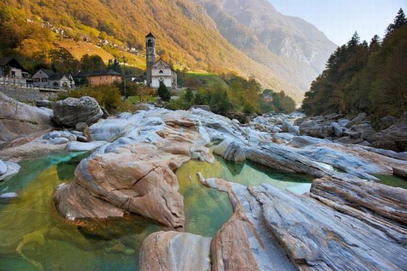 River Flowing Through Rocks — Green, Serene