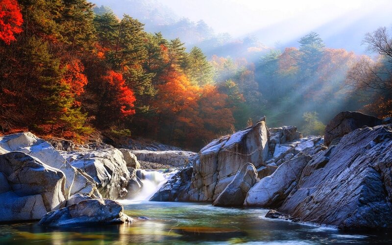 River Flowing Through Rocks — Red, Serene