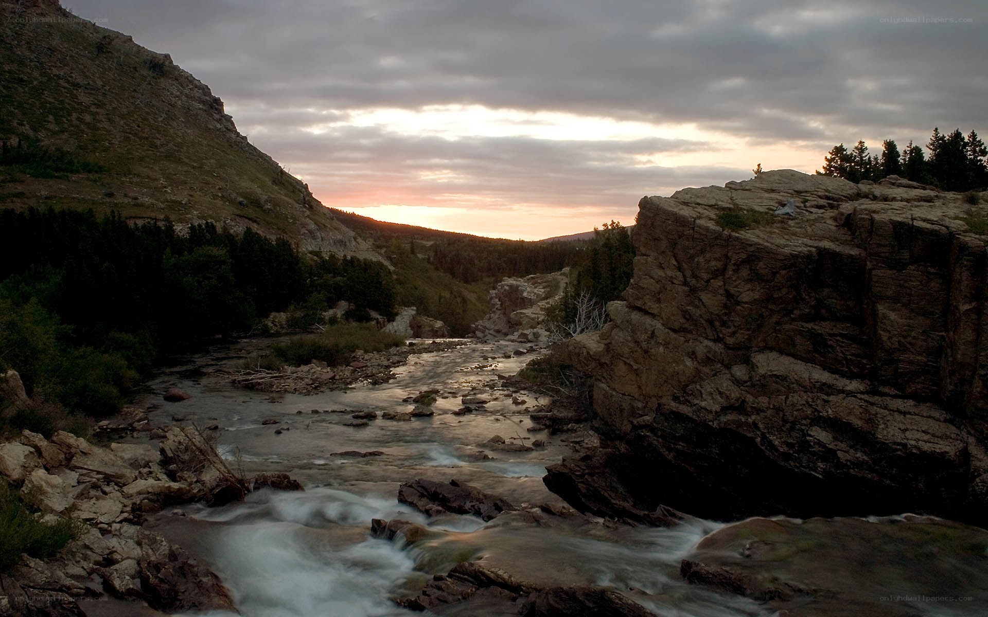River flowing through rocky canyon