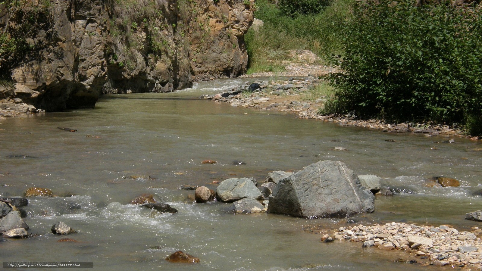 River flowing through rocky canyon