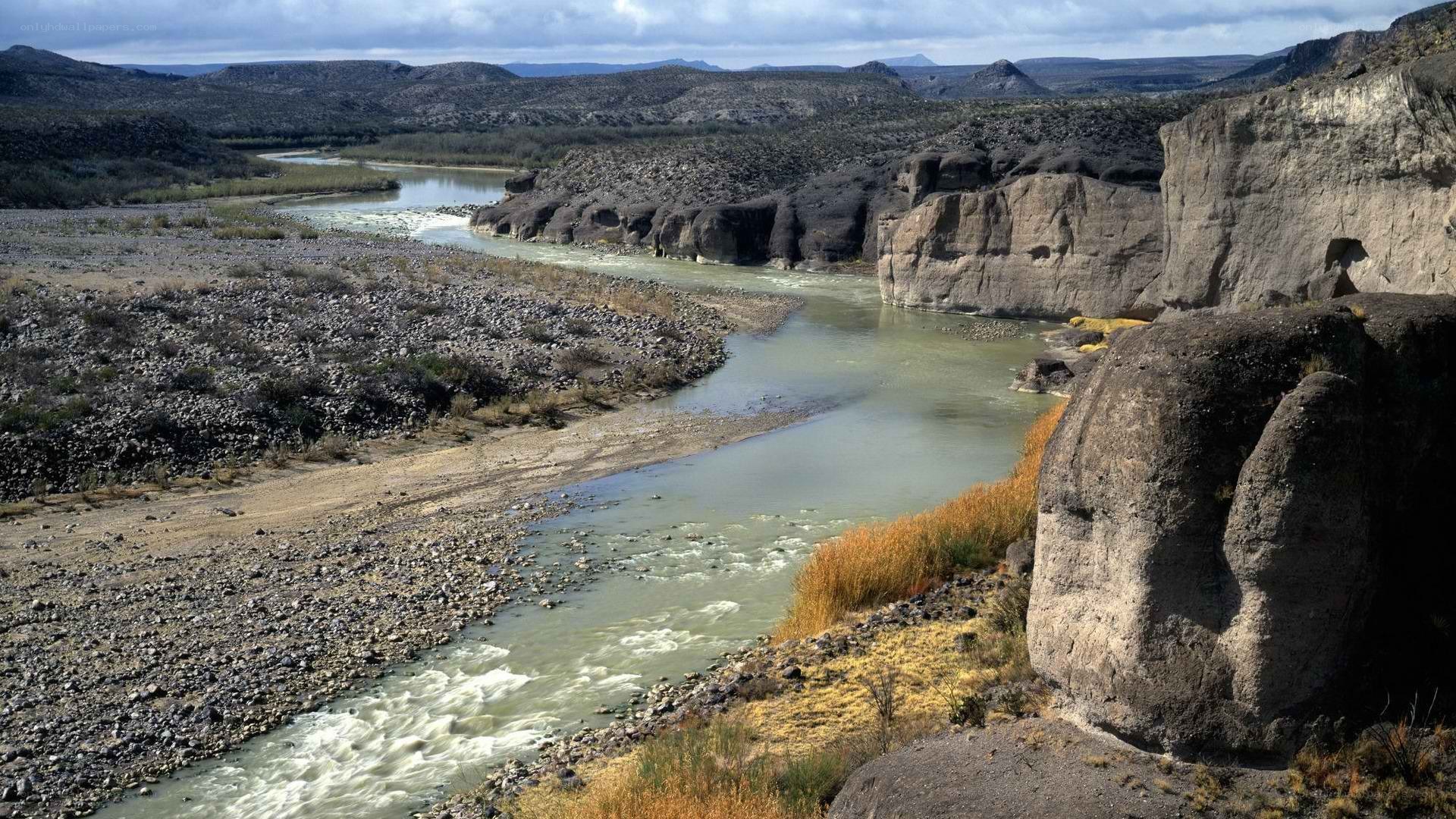 river flowing through rocky canyon