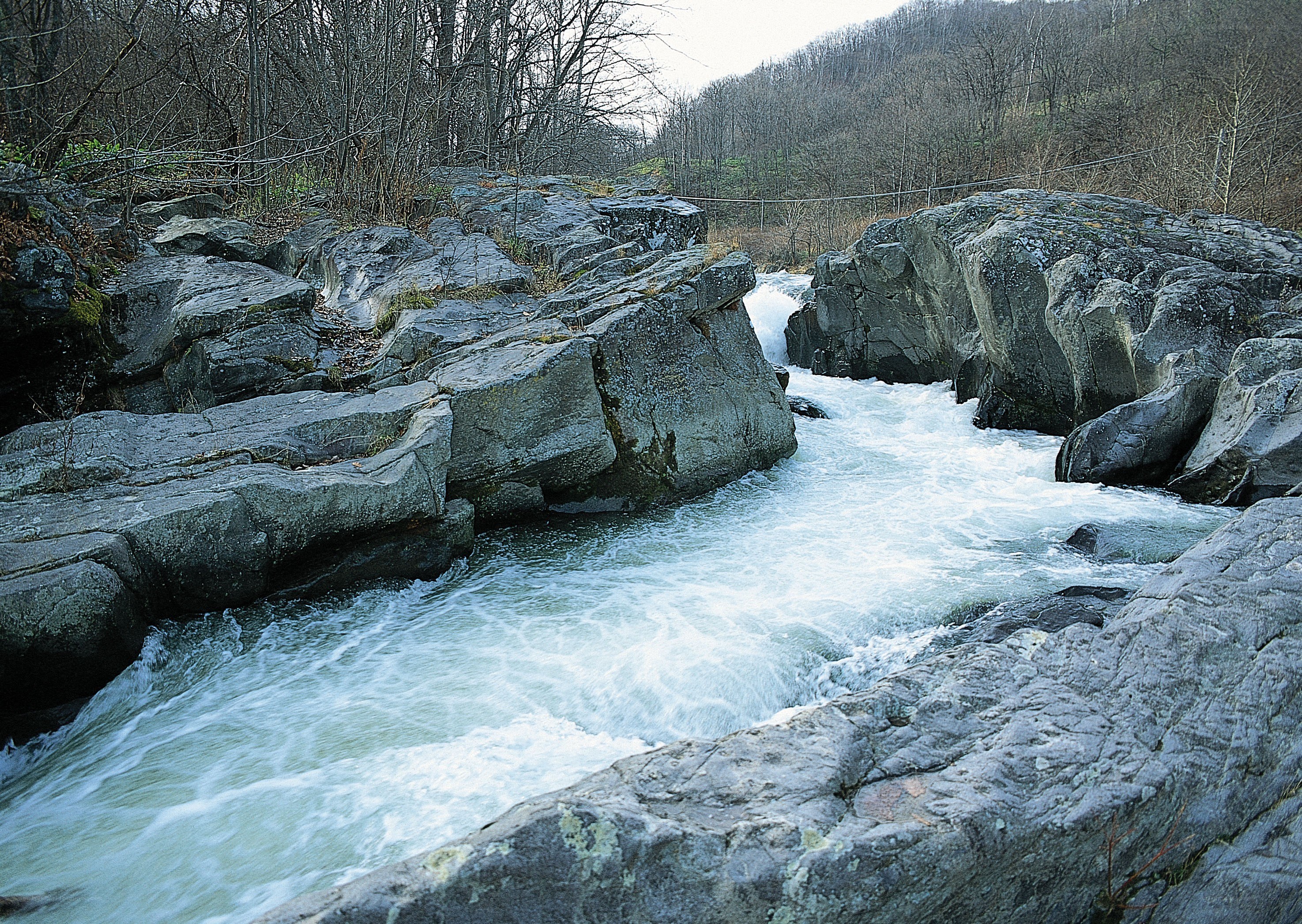 river flowing through rocky canyon
