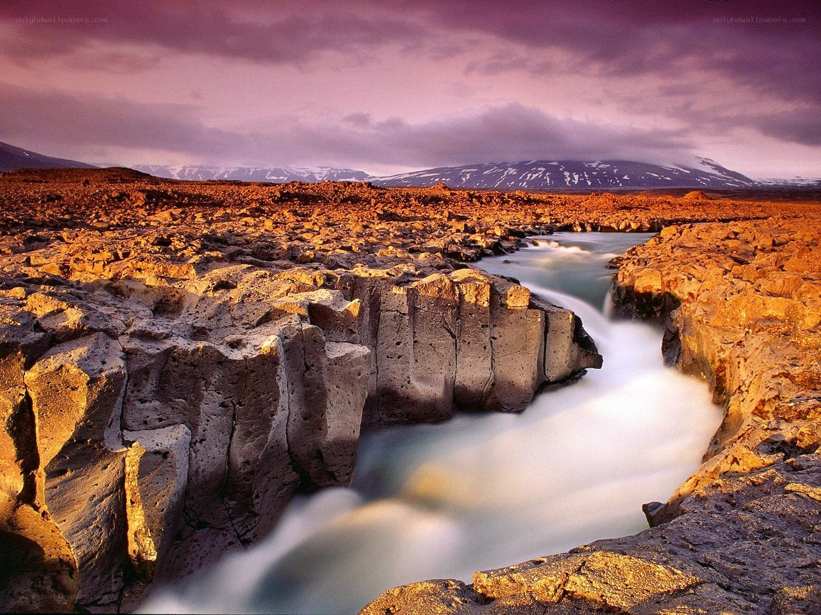 River flowing through rocky canyon