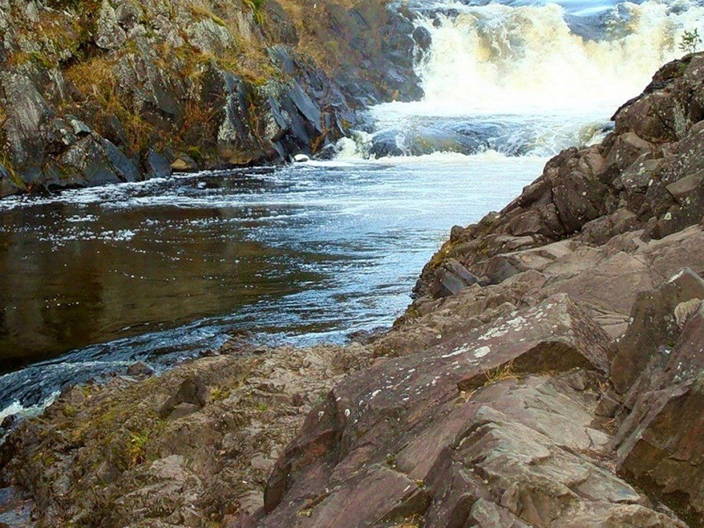 river flowing through rocky canyon