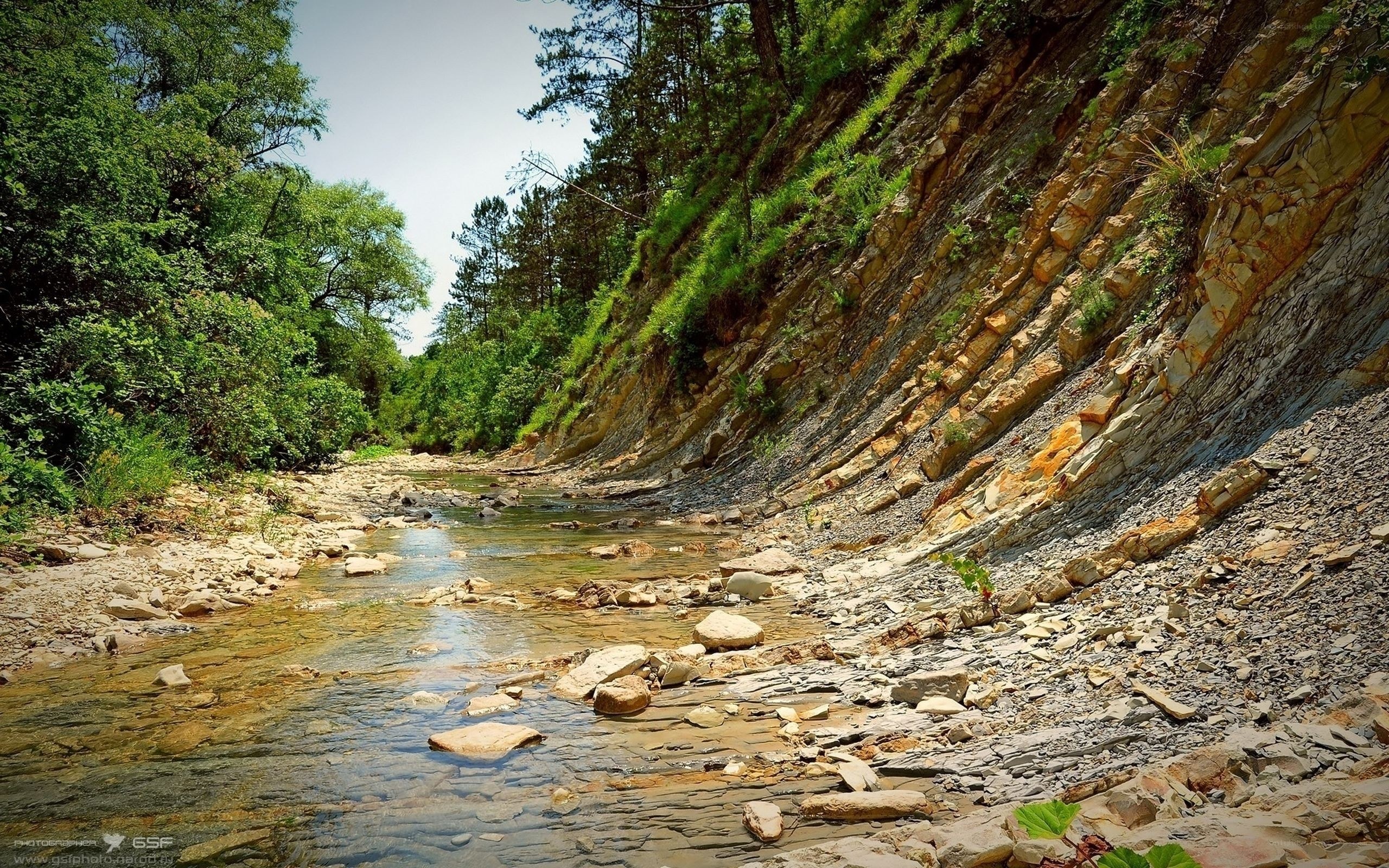 River flowing through rocky canyon