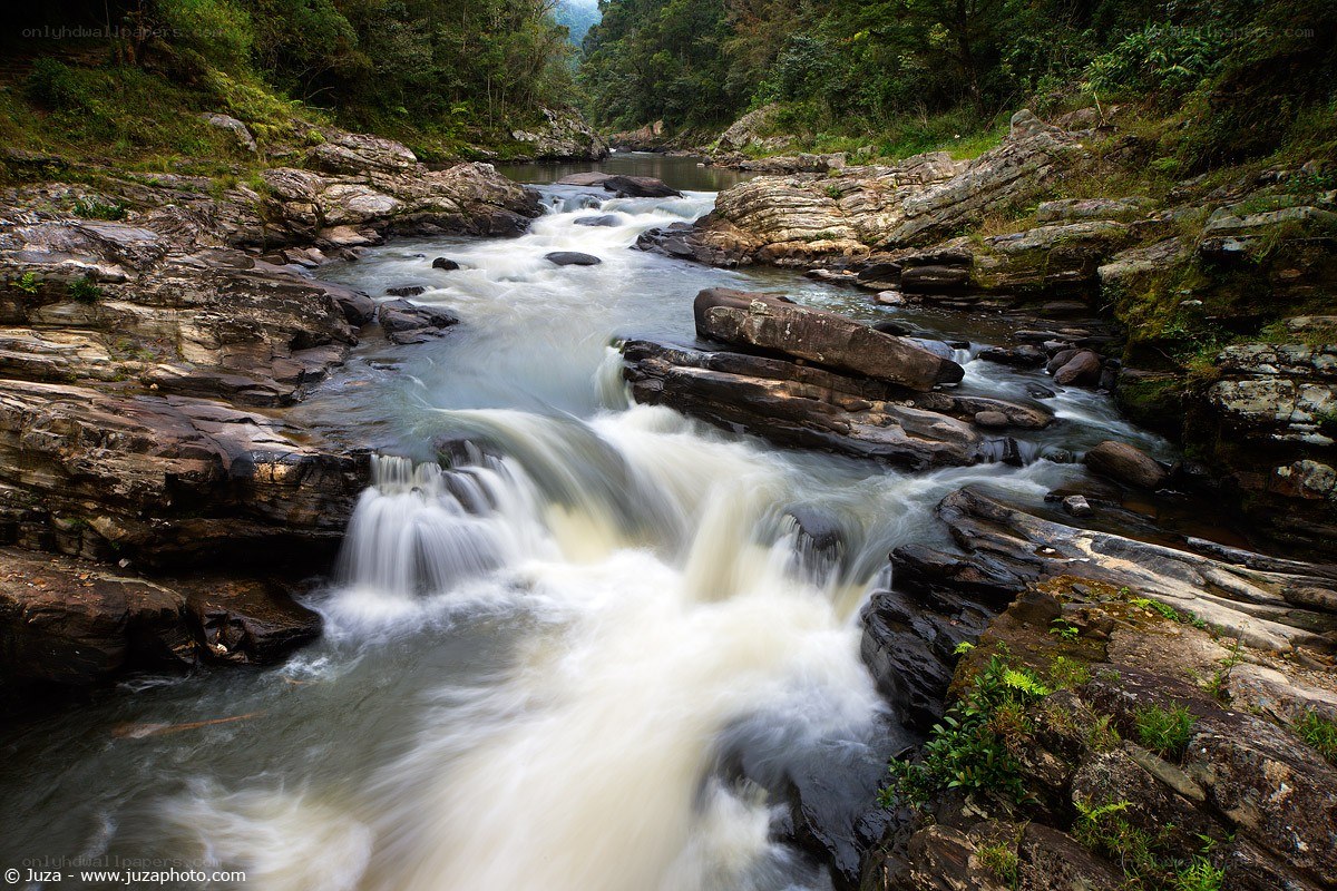 River flowing through rocky canyon