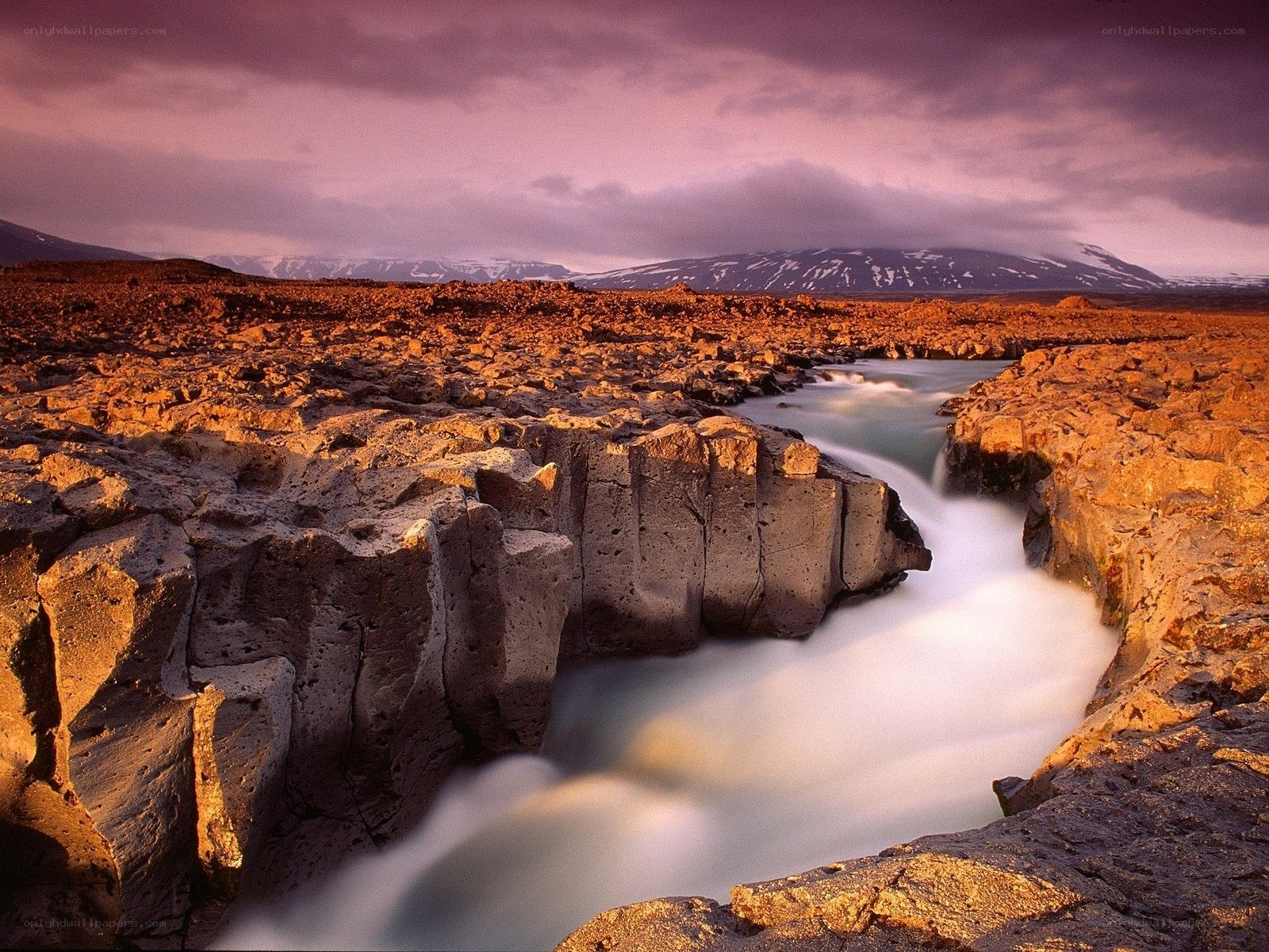 River flowing through rocky canyon