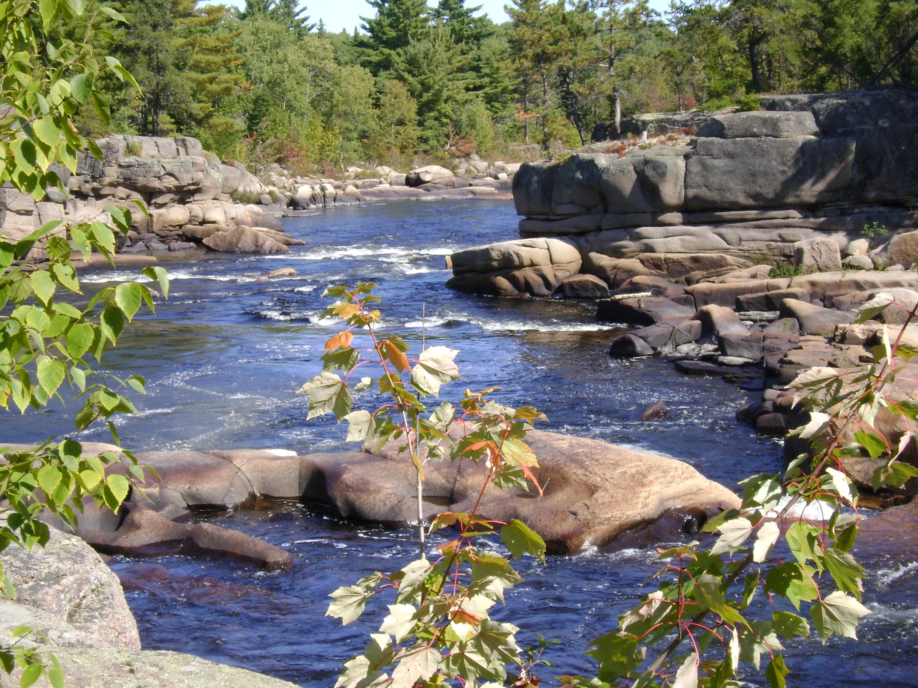 River flowing through rocky landscape
