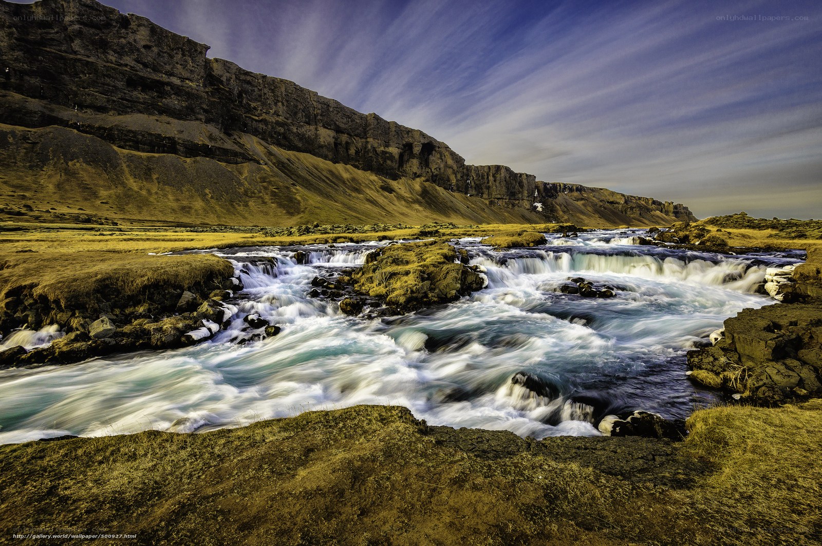 River flowing through rocky landscape