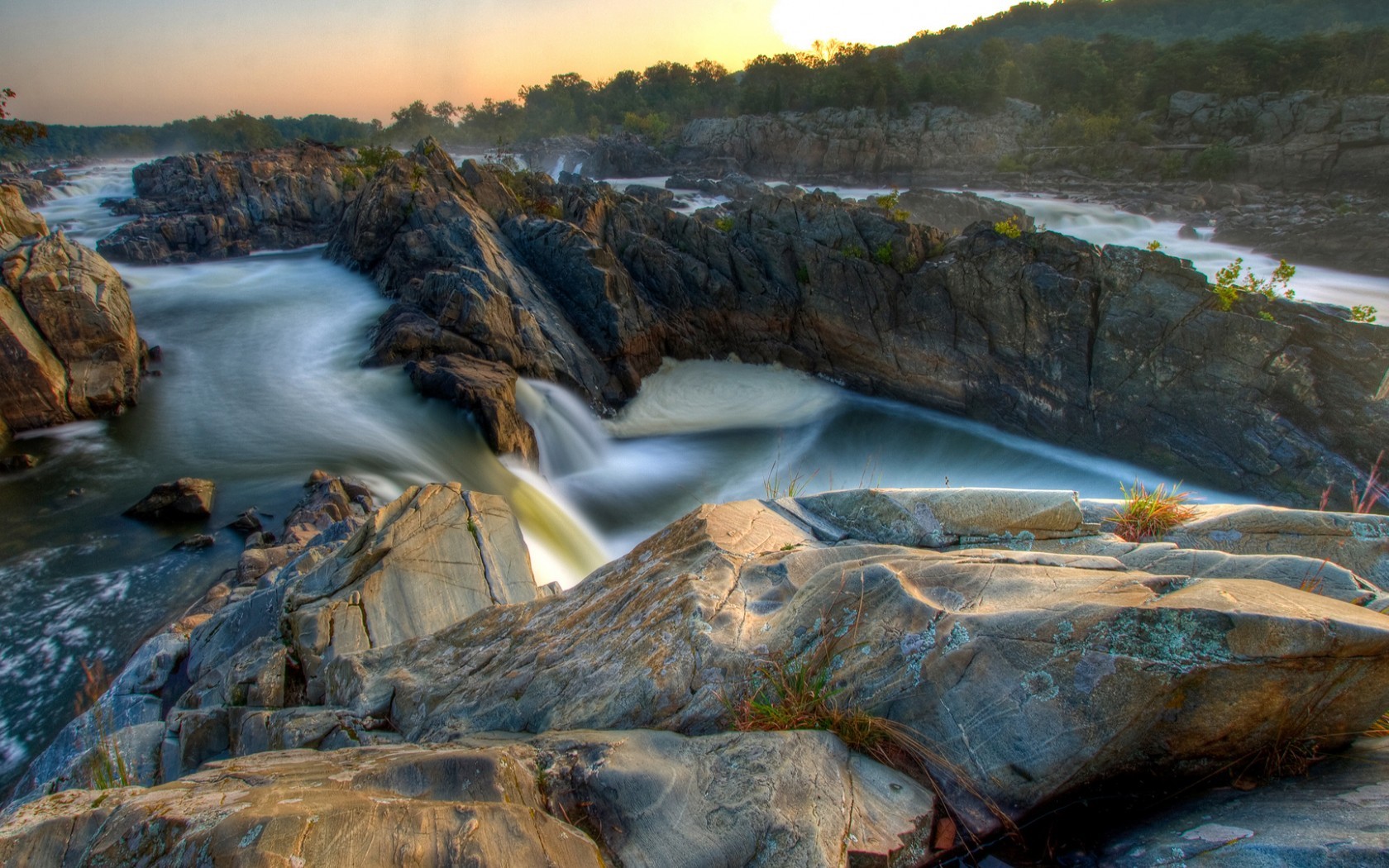 River flowing through rocky rapids