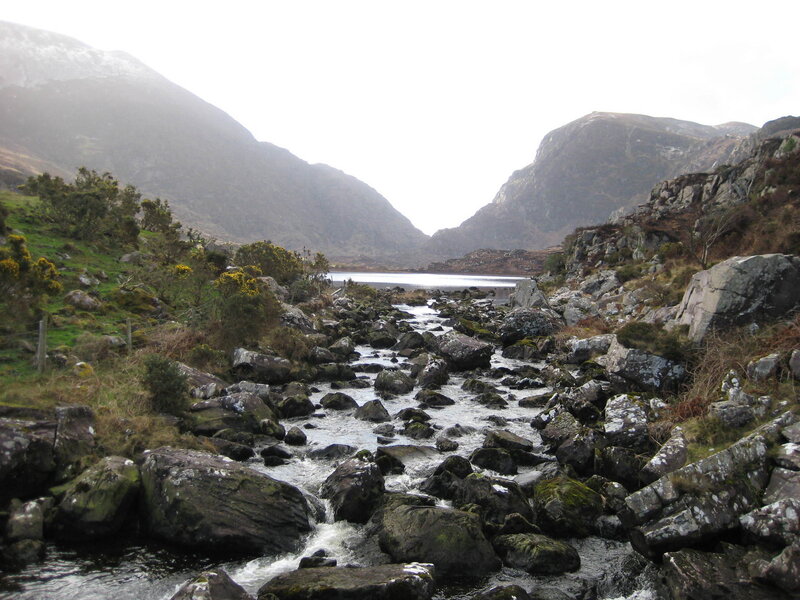 river flowing through rocky valley