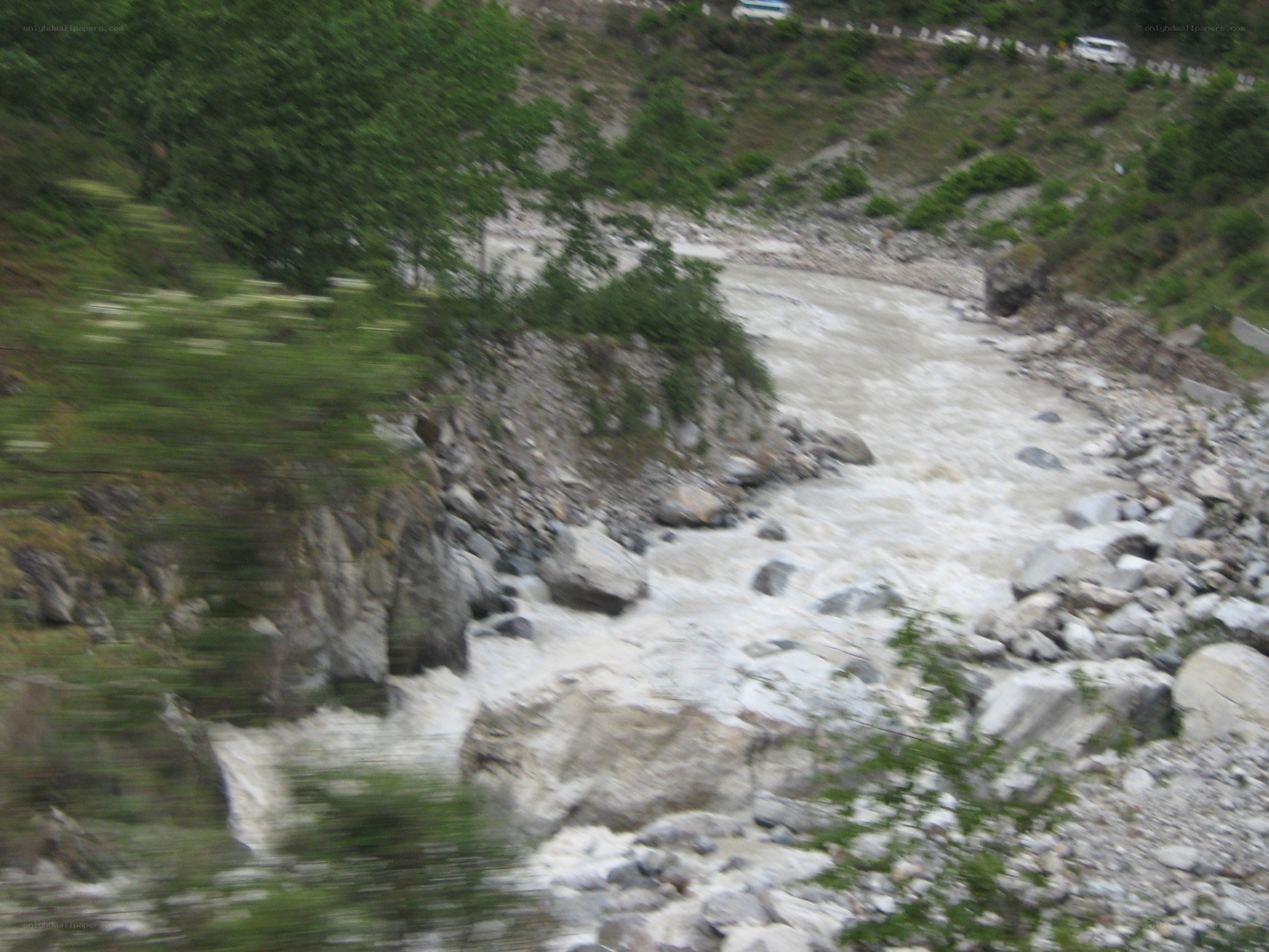 river flowing through rocky valley