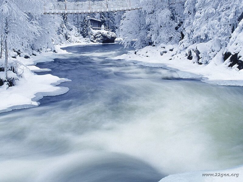 River Flowing Through Snow