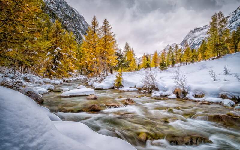 River Flowing Through Snow — Yellow