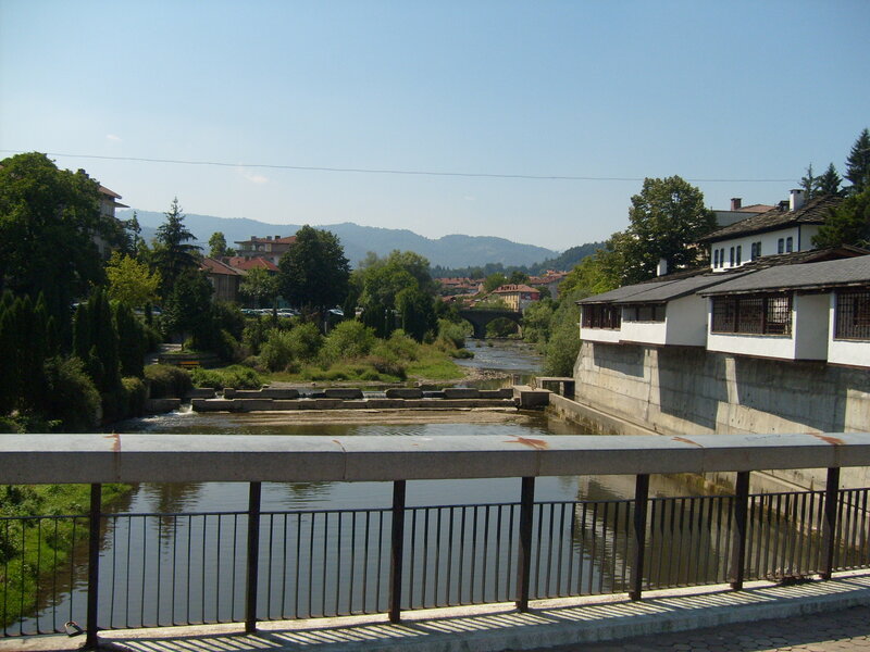 River Flowing Through Town — Blue, Serene