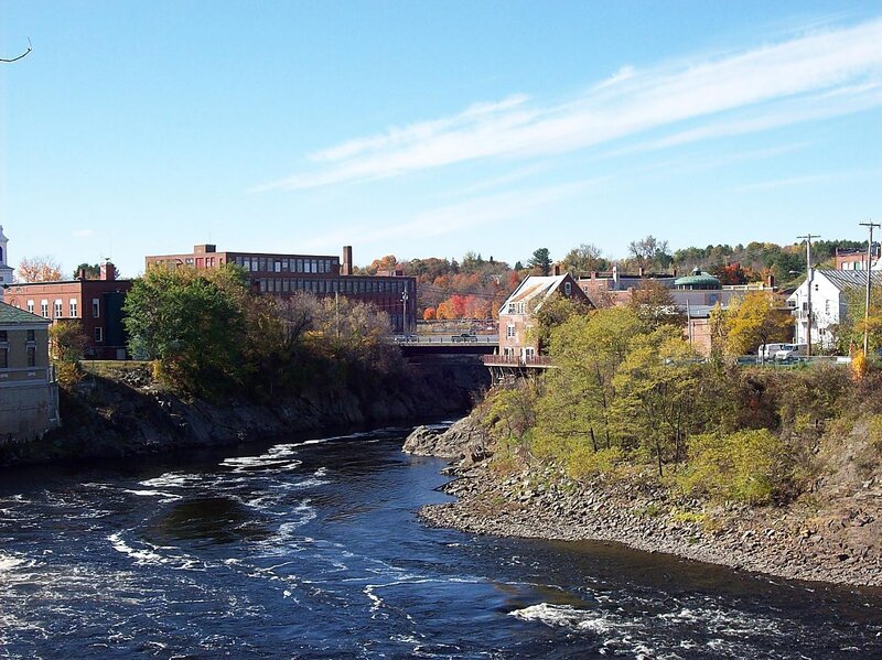 River Flowing Through Town — Blue