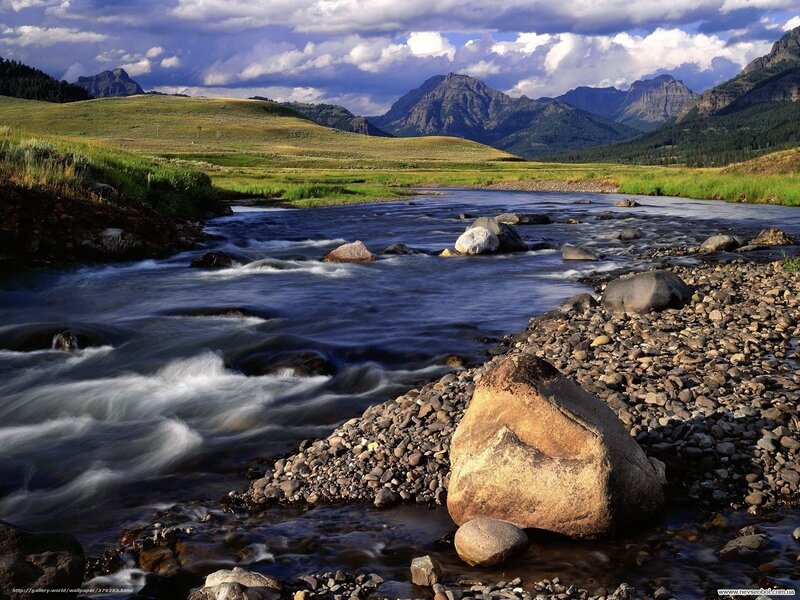 River Flowing Through Valley — Blue, Dramatic, Afternoon, Photograph, Mountains, Gravel