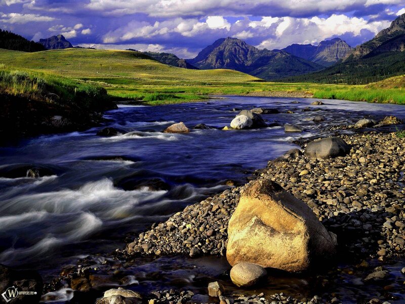 River Flowing Through Valley — Blue, Dramatic, Afternoon, Photograph, Mountains