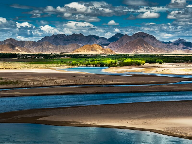 River Flowing Through Valley — Blue, Dramatic, Afternoon