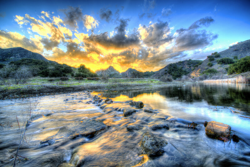 River Flowing Through Valley — Blue, Dramatic, Sunset, Photograph, Mountains