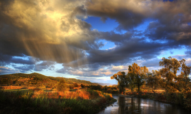 River Flowing Through Valley — Blue, Dramatic