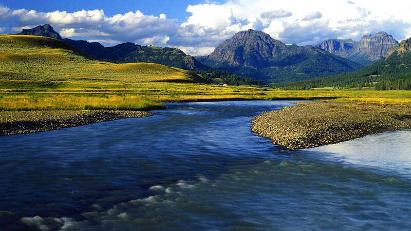 River Flowing Through Valley — Blue, Serene, Afternoon, Photograph, Mountains, Grasslands, Clouds