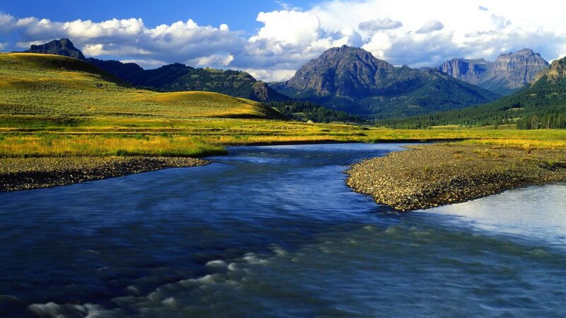 River Flowing Through Valley — Blue, Serene, Afternoon, Photograph, Mountains, Grasslands, Sky
