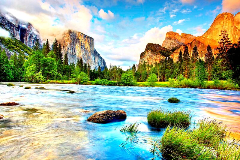River Flowing Through Valley — Blue, Serene, Sunset, Photograph, Mountains, Trees, Rocks