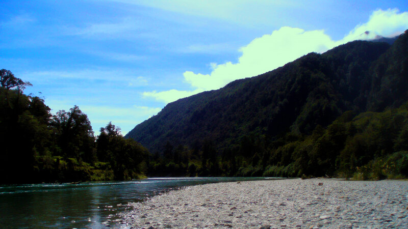 River Flowing Through Valley — Blue, Serene