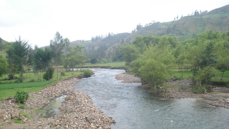 River Flowing Through Valley — Green, Calm, Photograph