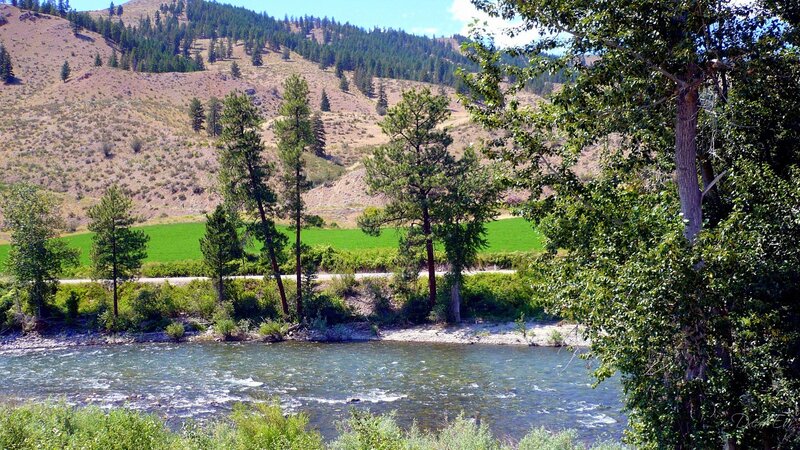 River Flowing Through Valley — Green, Serene, Afternoon, Photograph, Trees, Hills