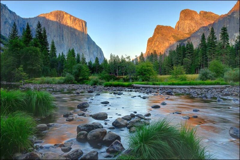 River Flowing Through Valley