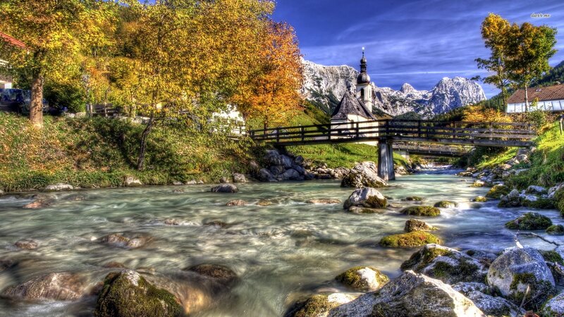 River Flowing Through Village — Blue, Serene
