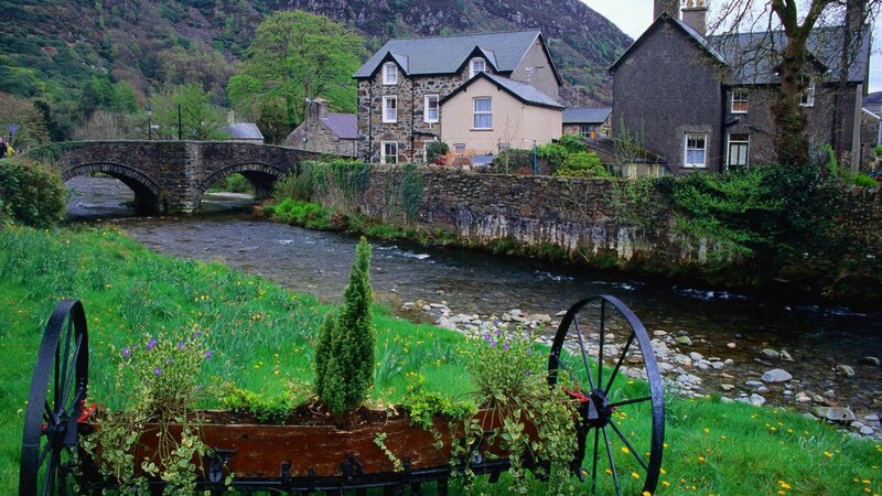 River Flowing Through Village — Green, Serene, Spring