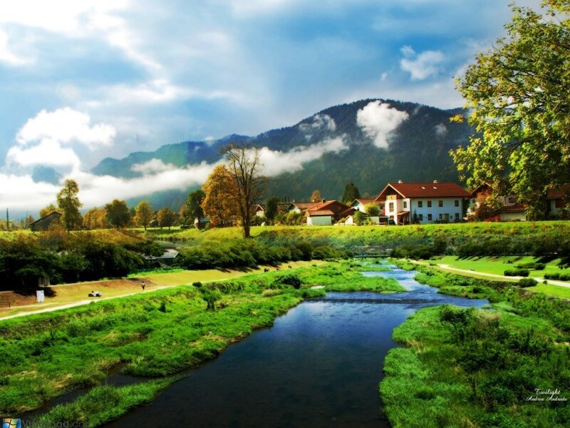 River Flowing Through Village — Green