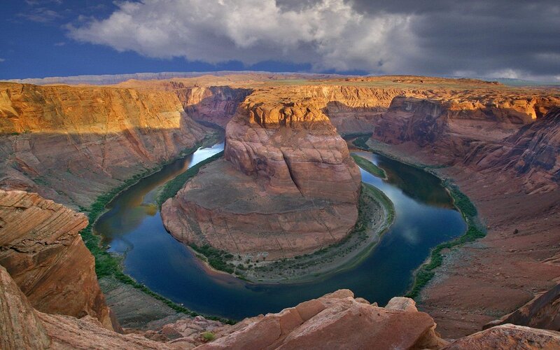River Forming a Horseshoe Bend — Blue