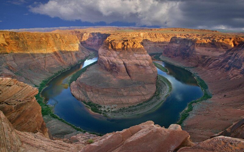 River Forming a Horseshoe Bend — Brown