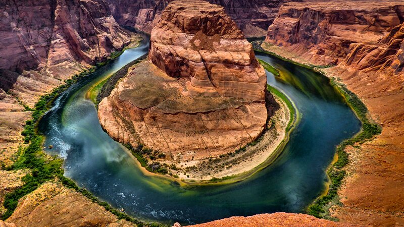 River Forming a Horseshoe Bend — Red