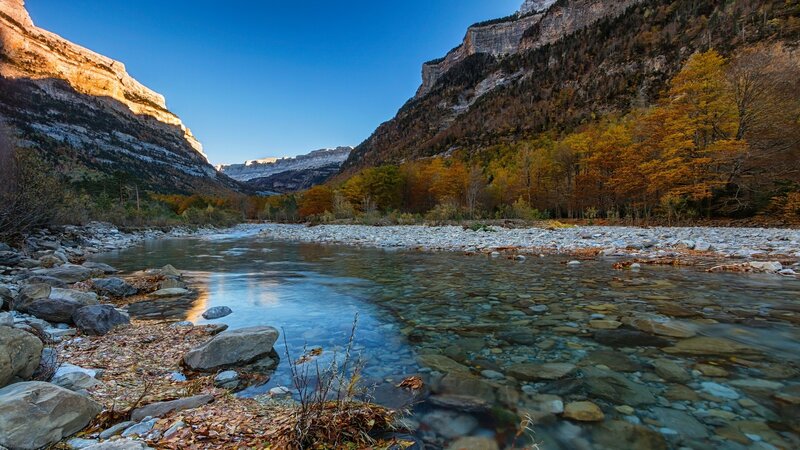 River in autumn mountain valley