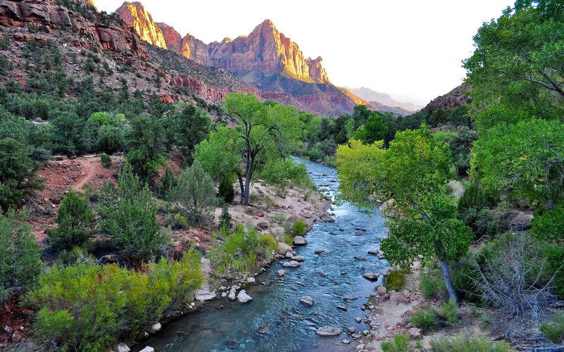 river in canyon at sunset