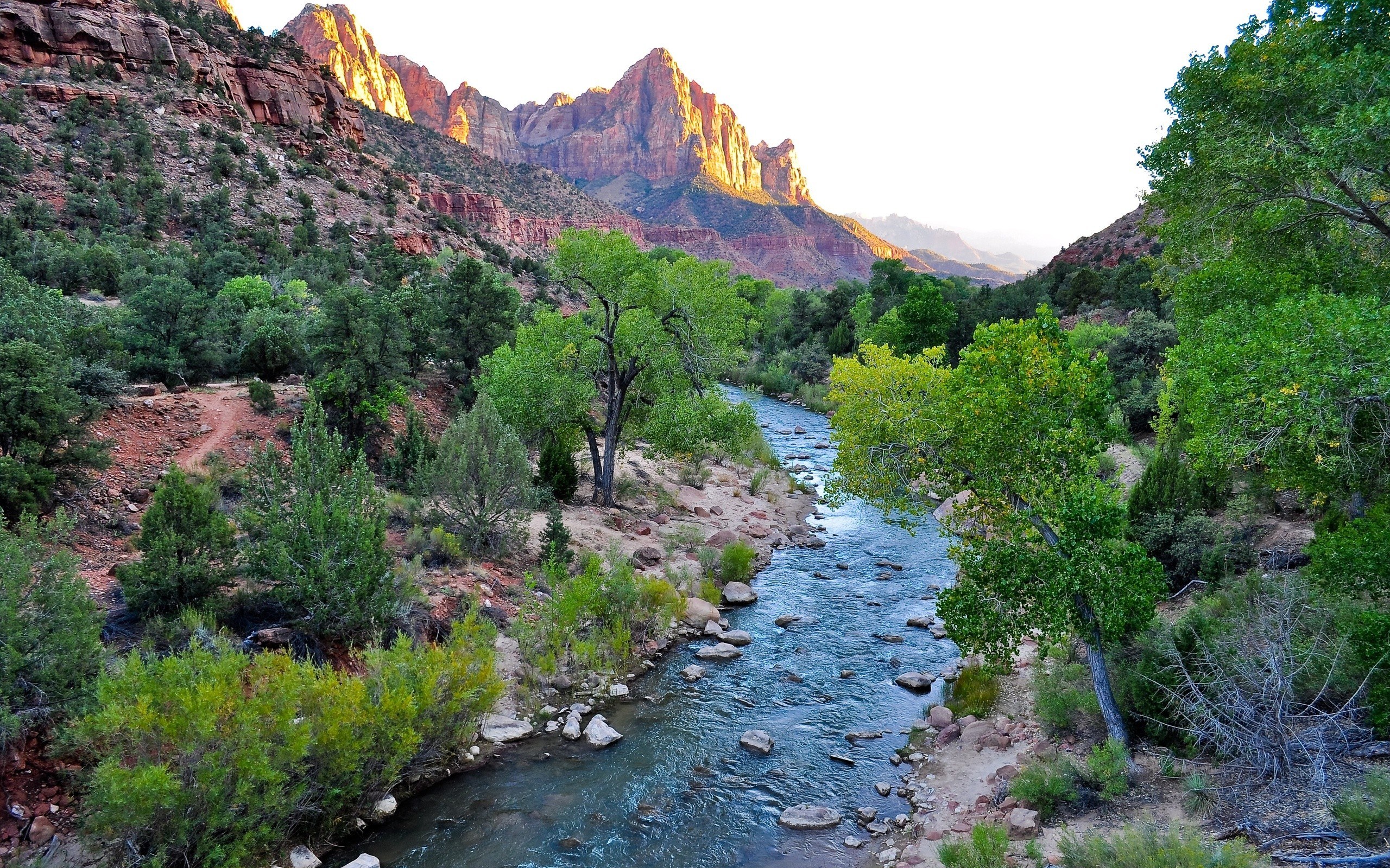 river in canyon at sunset