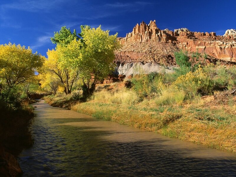 River in Canyon — Blue, Serene, Autumn, Photograph, Trees, Cliffs, Sky