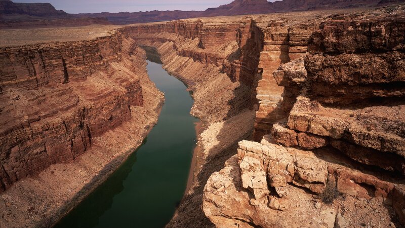 River in Canyon — Brown, Dramatic, Afternoon, Photograph, Rock, Sky