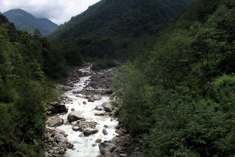 river in forested mountain valley