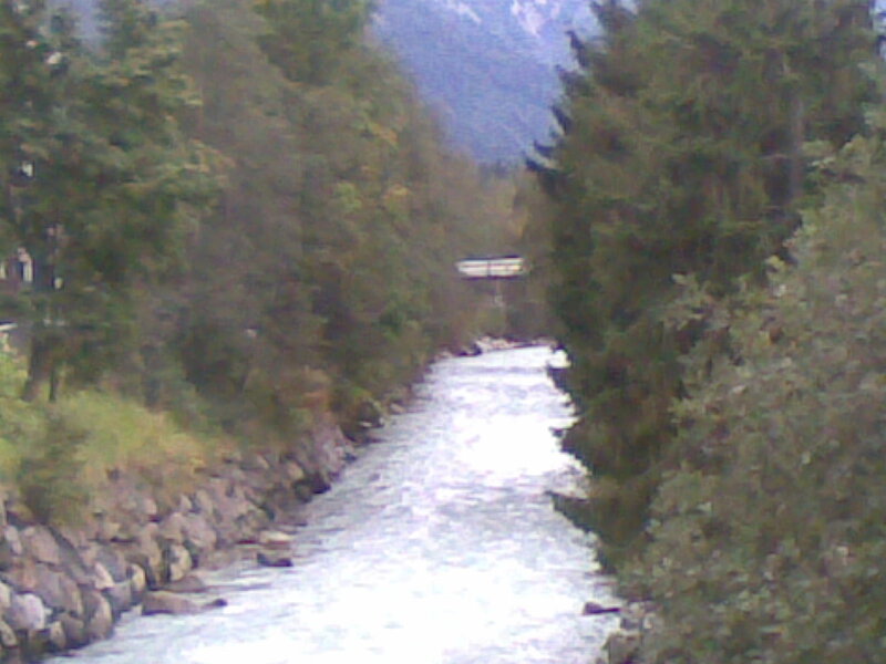 river in forested valley