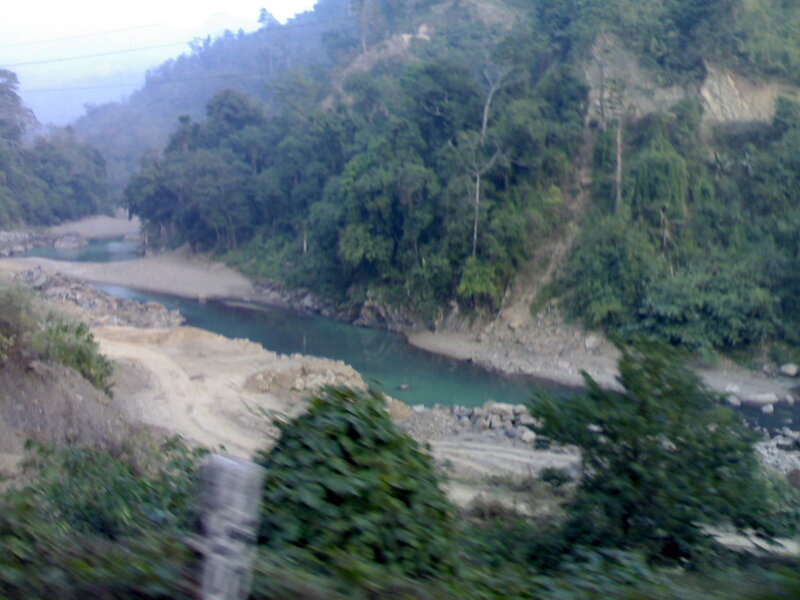 River in Forested Valley — Green, Serene, Photograph