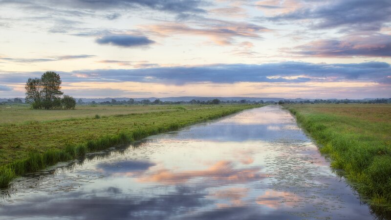 River in Green Field — Blue, Serene