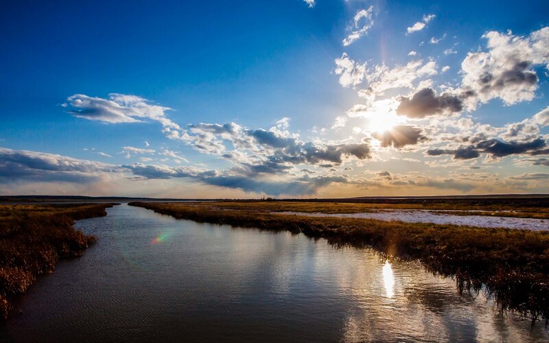 River in Marshland — Blue, Serene, Sunset