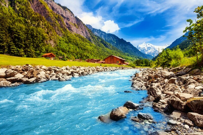 River in Mountain Valley — Blue, Serene, Afternoon, Photograph, Mountains, Cabin