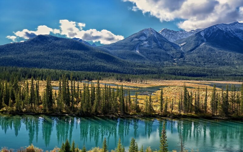 River in Mountain Valley — Blue, Serene, Afternoon, Photograph, Mountains, Forest, Sky, Green